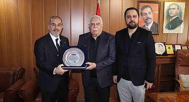 Başkan Alan'dan ekonomiye güç veren isimlere vefa